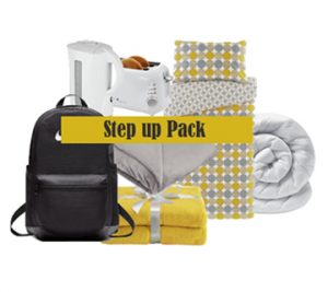 a pack of household items such a kettle, toaster, duvet and bedding, back pack